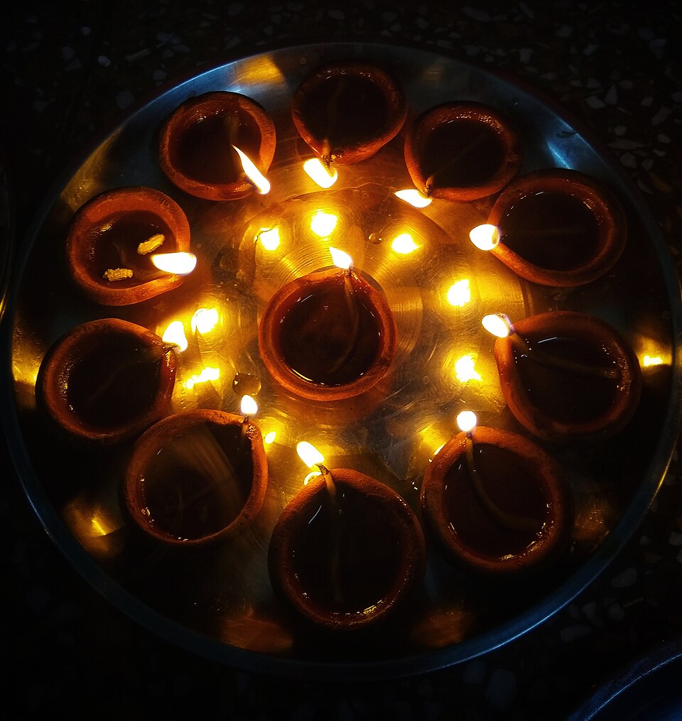 Earthen lamps lit for Diwali