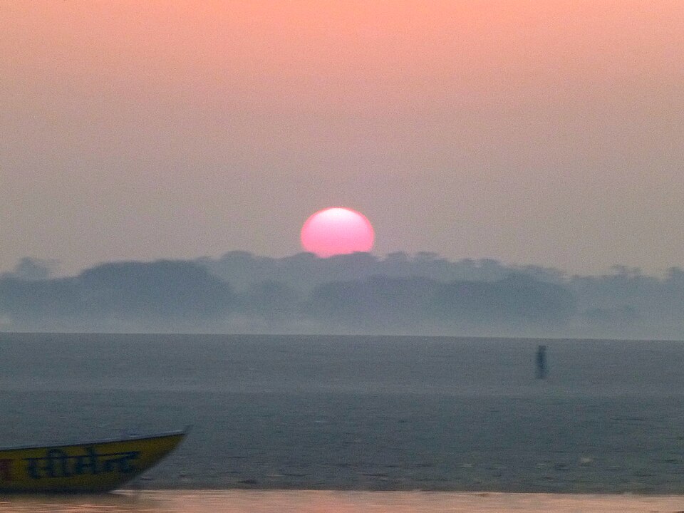 Sunrise over the Ganges at Varanasi; an illustration of the daily turning from night to morning